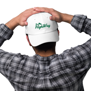 The Highway logo dad hat in white backwards on head