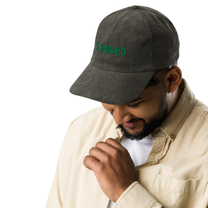 Vintage Corduroy Cap with "Stoned" on the front worn by a man